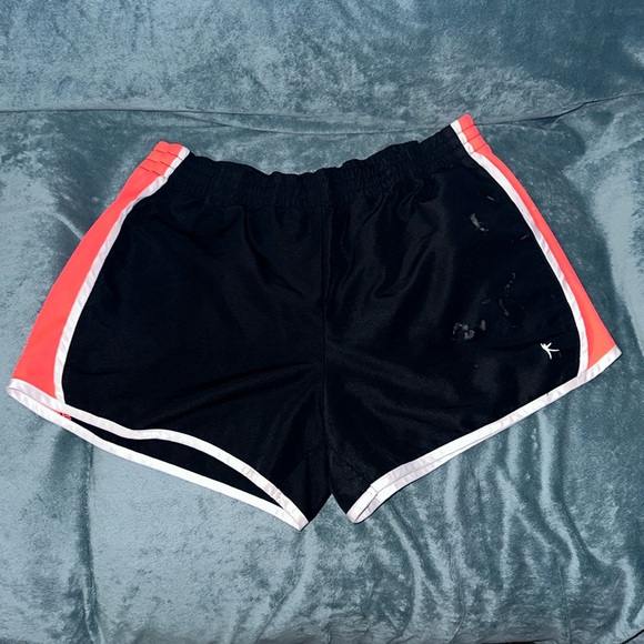 Danskin now large 12-14 black white and orange shorts stained - Picture 1 of 6